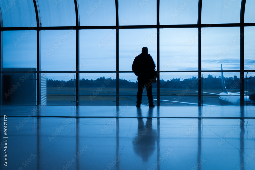 silhouette of a man at the airport silhouette of a man at the airport