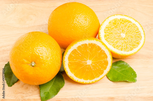 Navel orange fruit on wooden background