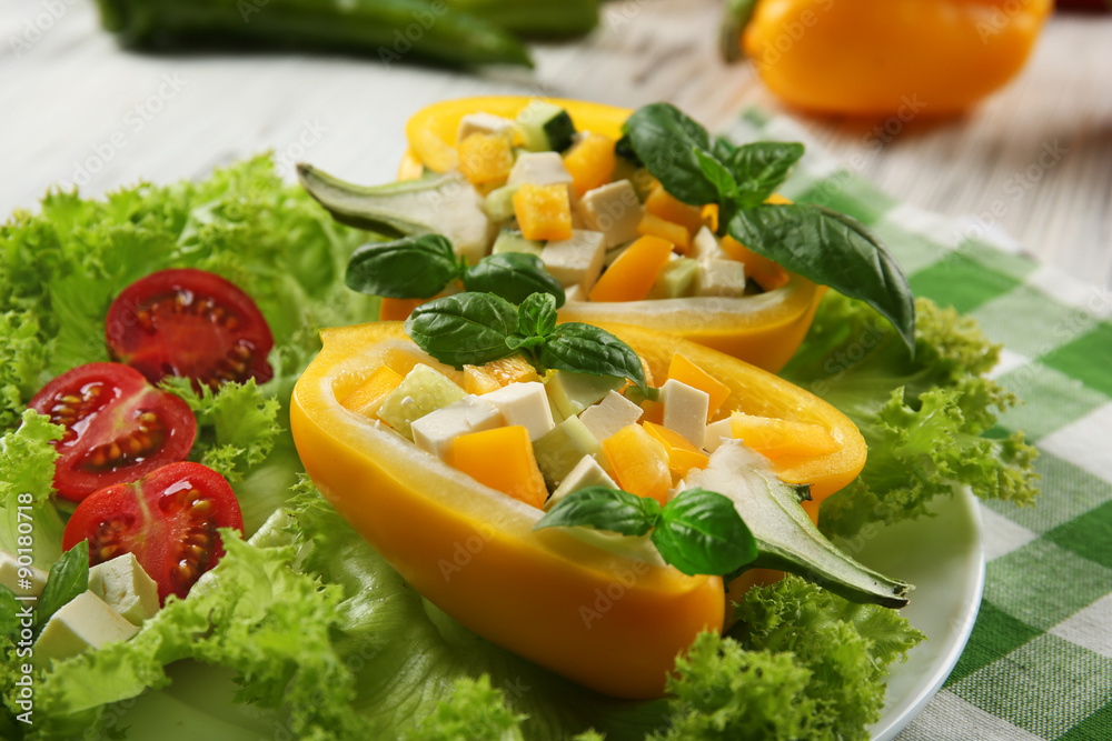 Fresh green salad in pepper on table close up Fresh green salad in pepper on table close up