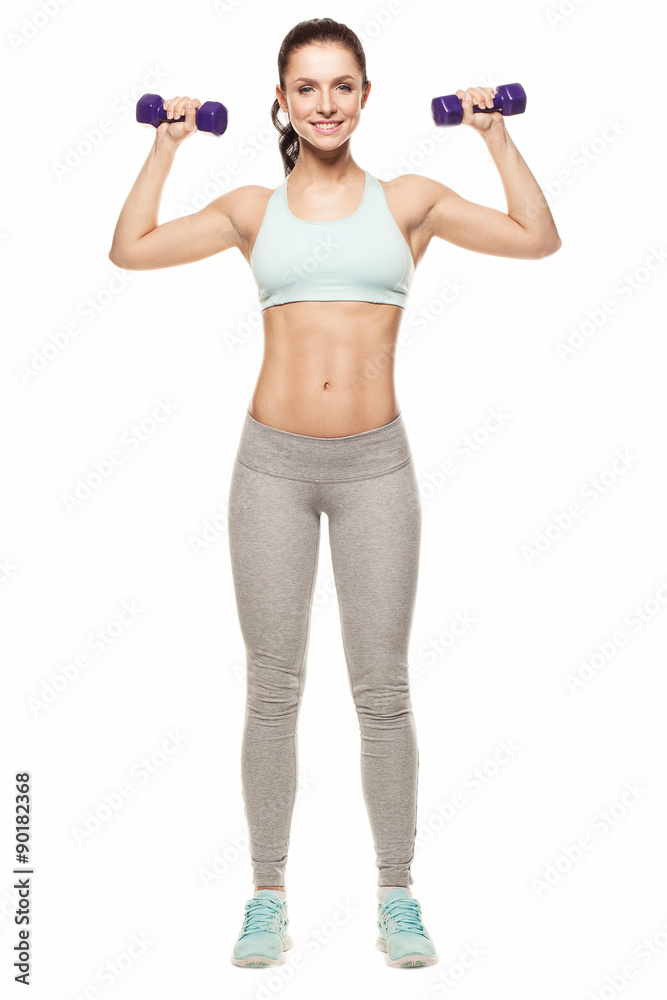 sporty woman do her workout with dumbbells, isolated on white background sporty woman do her workout with dumbbells, isolated on white background