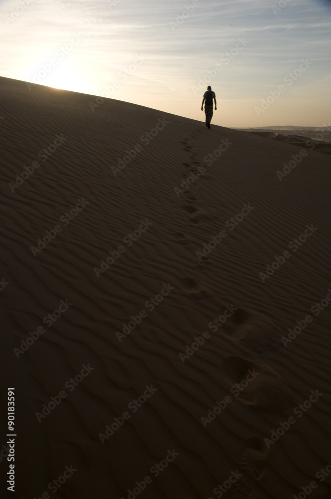 Walking in a desert dunes, Abu Dhabi Desert Walking in a desert dunes, Abu Dhabi Desert