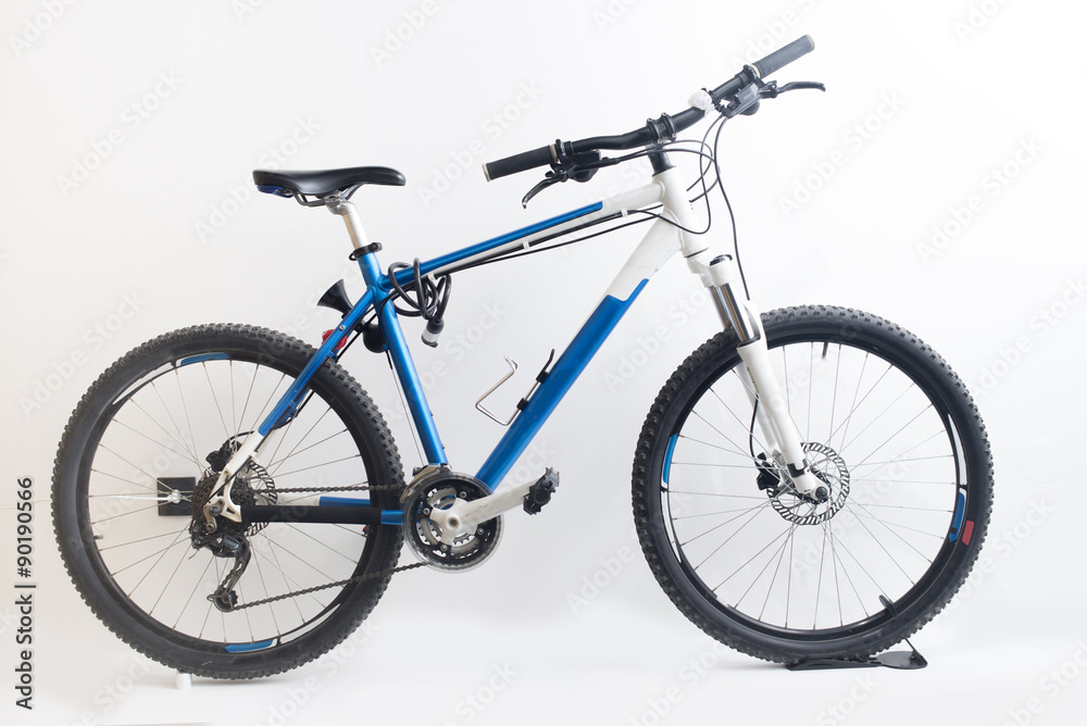 Blue mountain bike isolated on a white background