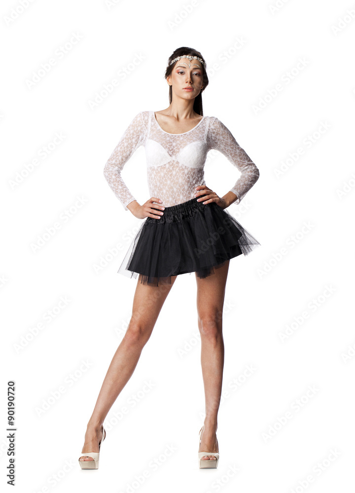 Portrait of a beautiful slim model in black skirt and white blou Portrait of a beautiful slim model in black skirt and white blou