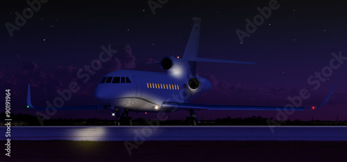 Private jet taxiing in the dark