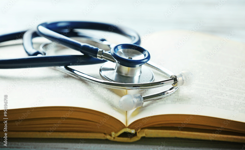 Stethoscope on open book close up Stethoscope on open book close up