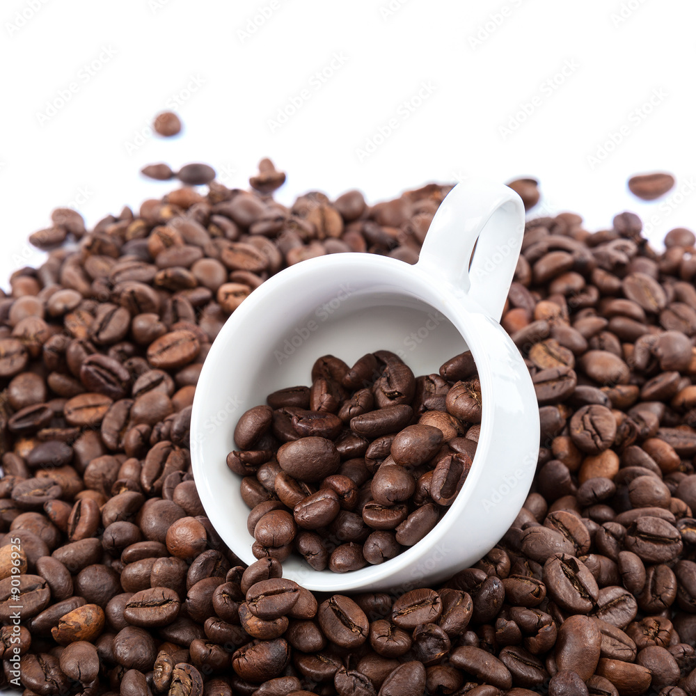 Coffee beans and ceramic cup on white background. Coffee beans and ceramic cup on white background.