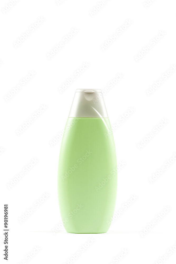 Plastic bottle of shampoo on a white background.