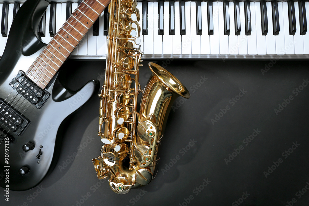 Obraz premium Musical instruments on black background