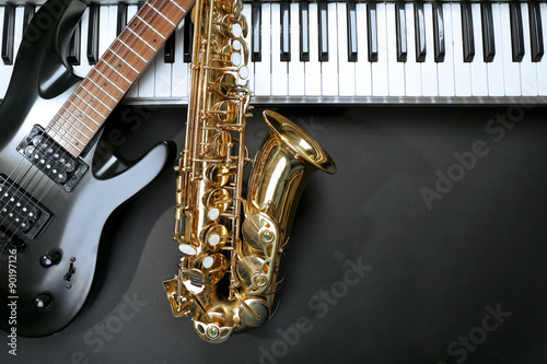 Musical instruments on black background