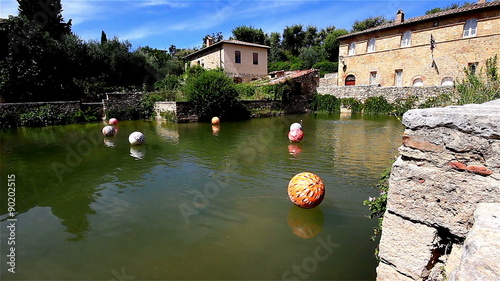 A timelapse clip at the tuscan village of Bagno Vignoni, near Siena, Tuscany, Italy, a thermal spring already known from the middle age, with an installation of floating balls
 photo