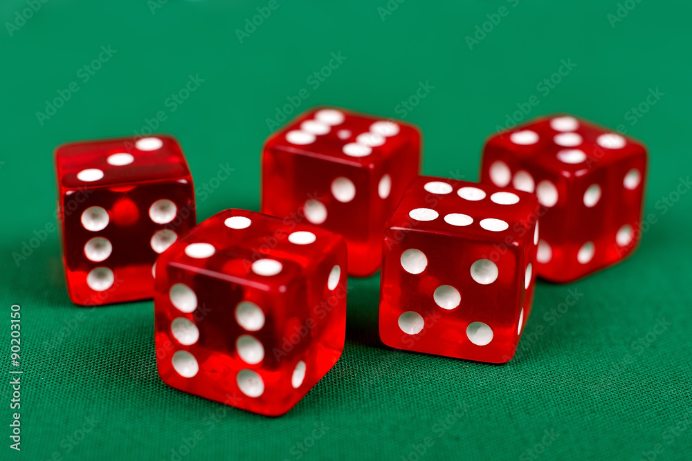 dice on green table dice on green table