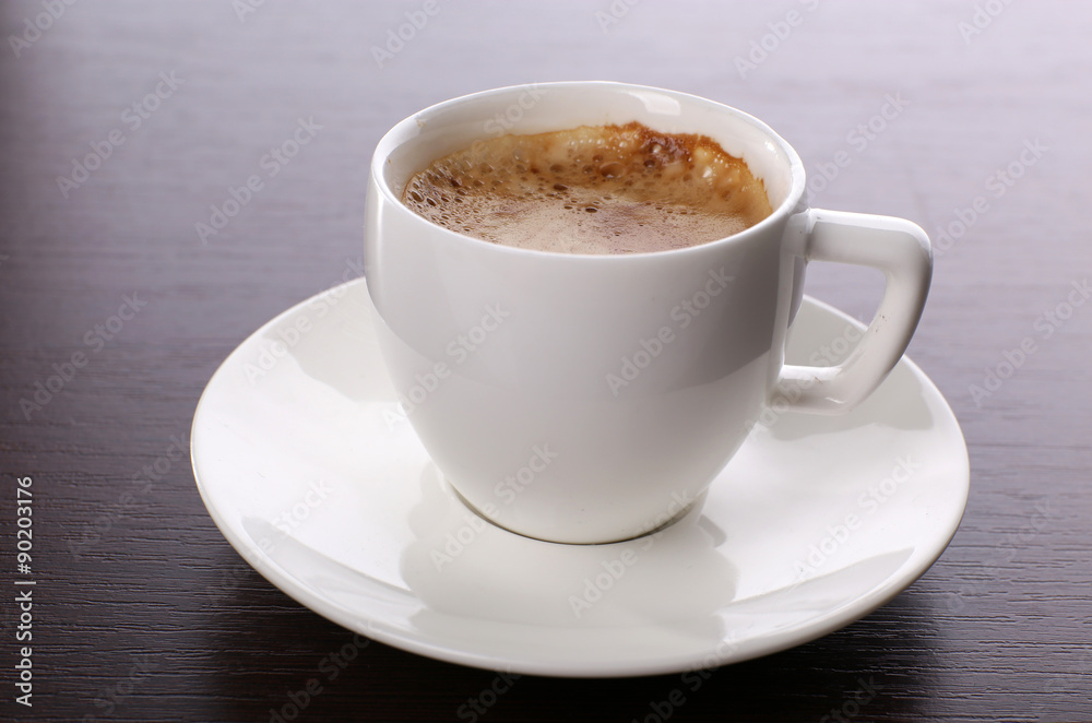 Cup of coffee on table close up Cup of coffee on table close up