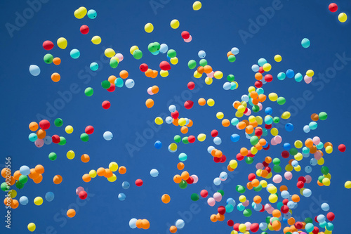 A lot of balloons in the sky during the celebration