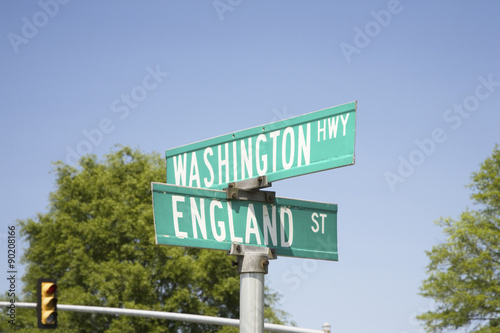 Street signs at an intersection that read England St. and Washington Hwy off Route 1 in Virginia south of Washington, DC, symbolizing the Special Relationship that exists between England and America © spiritofamerica