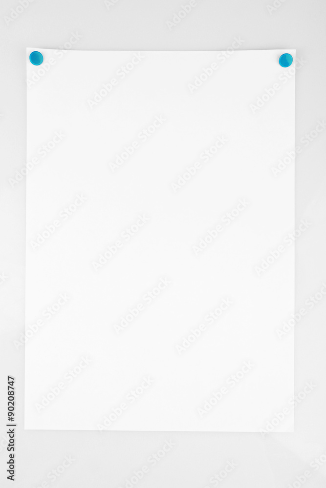 White sheet of paper attached on white background White sheet of paper attached on white background