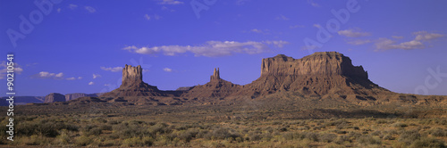 Panoramic view of red buttes and colorful spires of Monument Valley Navajo Tribal Park, Southern Utah near Arizona border