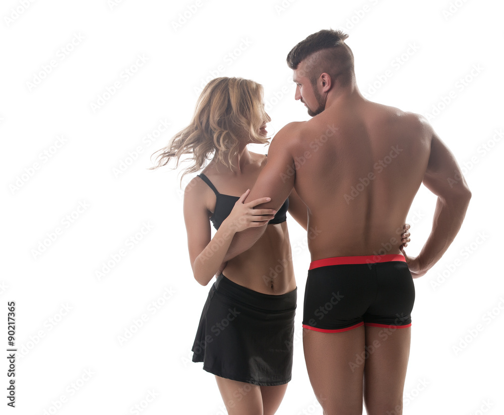 Athletic couple. Muscular man and pretty blonde Athletic couple. Muscular man and pretty blonde