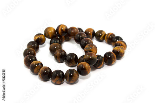 tiger's eye beads isolated on white