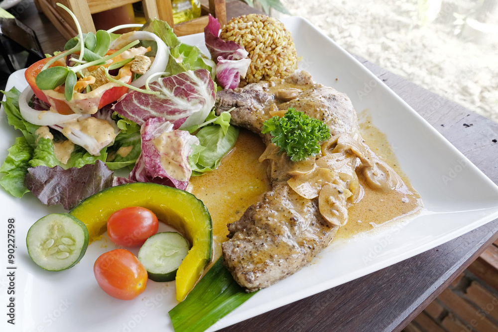 Pork chop steak with salad Pork chop steak with salad