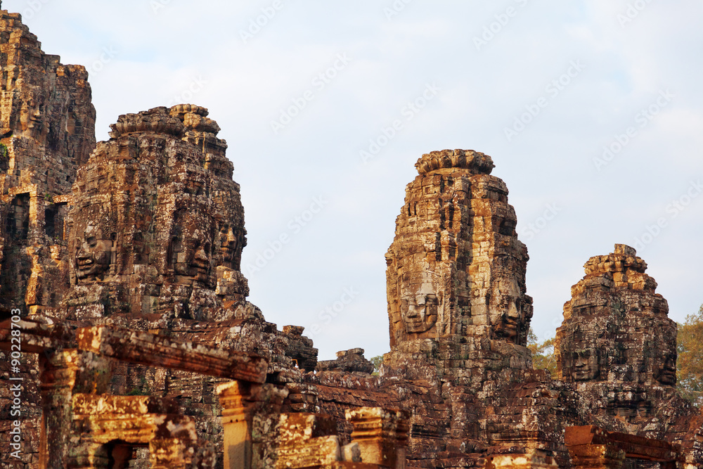Faces in Bayon Temple at sunset, Angkor Wat, Cambodia