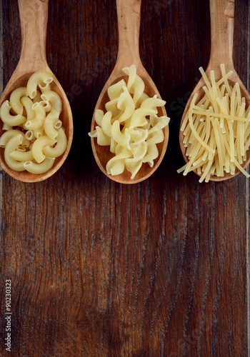 Tree spoons with different kinds of pasta