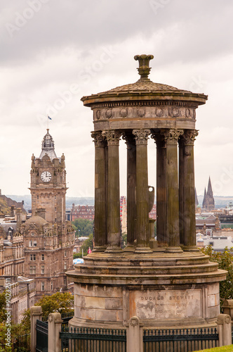 dugald stewart monument in front of edinburgh's skyline