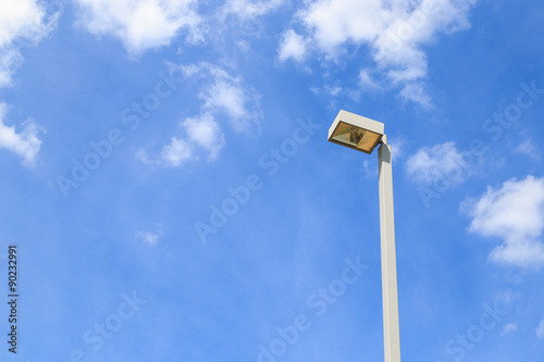 Street lamp and blue sky in the background