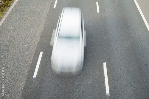 Speeding Car On Motorway photo