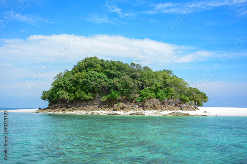 Tropical island on blue sea
