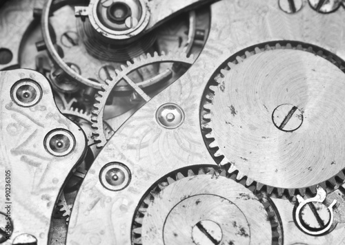 Black and white macro photo close-up view of metal clockwork