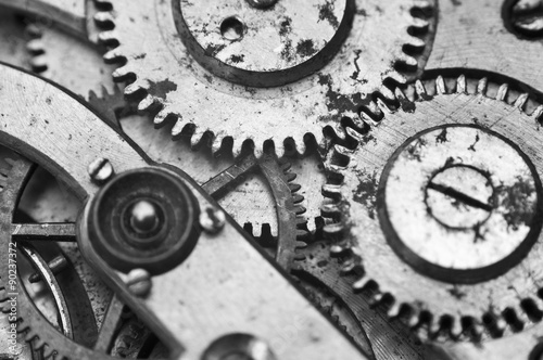 Black and white macro photo close-up view of metal clockwork