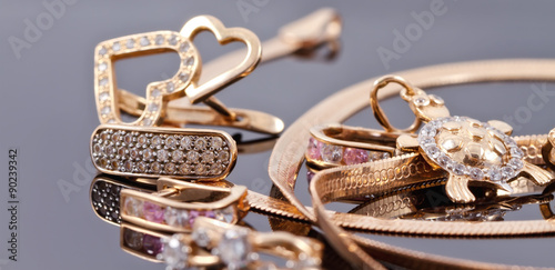 A variety of jewelry on the reflecting surface