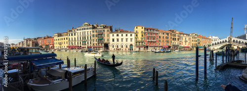 VENICE - FEBRUARY 8, 2015: Tourists along city canals. Venice at