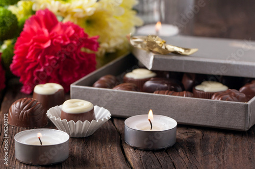 chocolate candy  candles and flowers