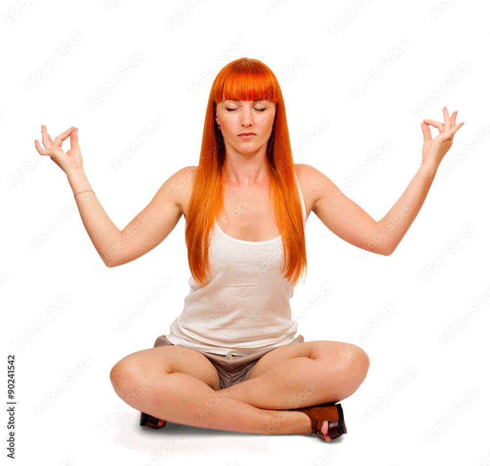 Young woman meditating on a white background Young woman meditating on a white background