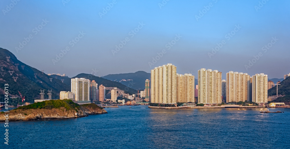 Sunset view to residential apartments building in Hong Kong seaf