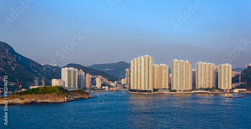 Sunset view to residential apartments building in Hong Kong seaf