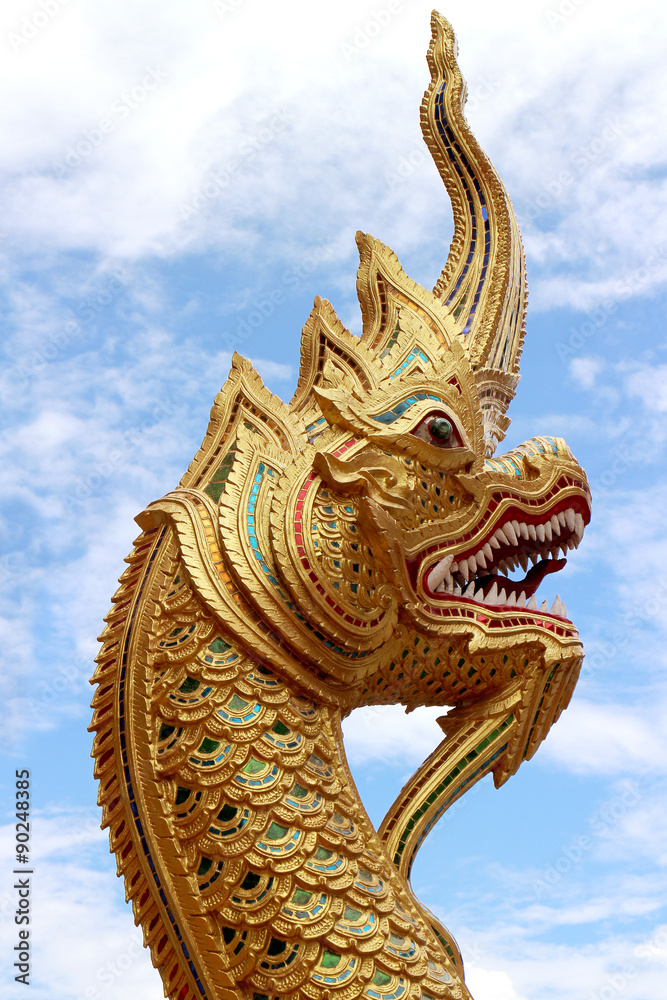 Fototapeta premium Golden snake sculpture in Chiang Mai temple, Thailand.