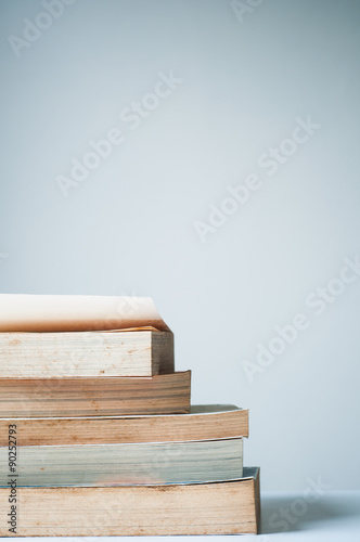 Stack of old books © tanawatpontchour