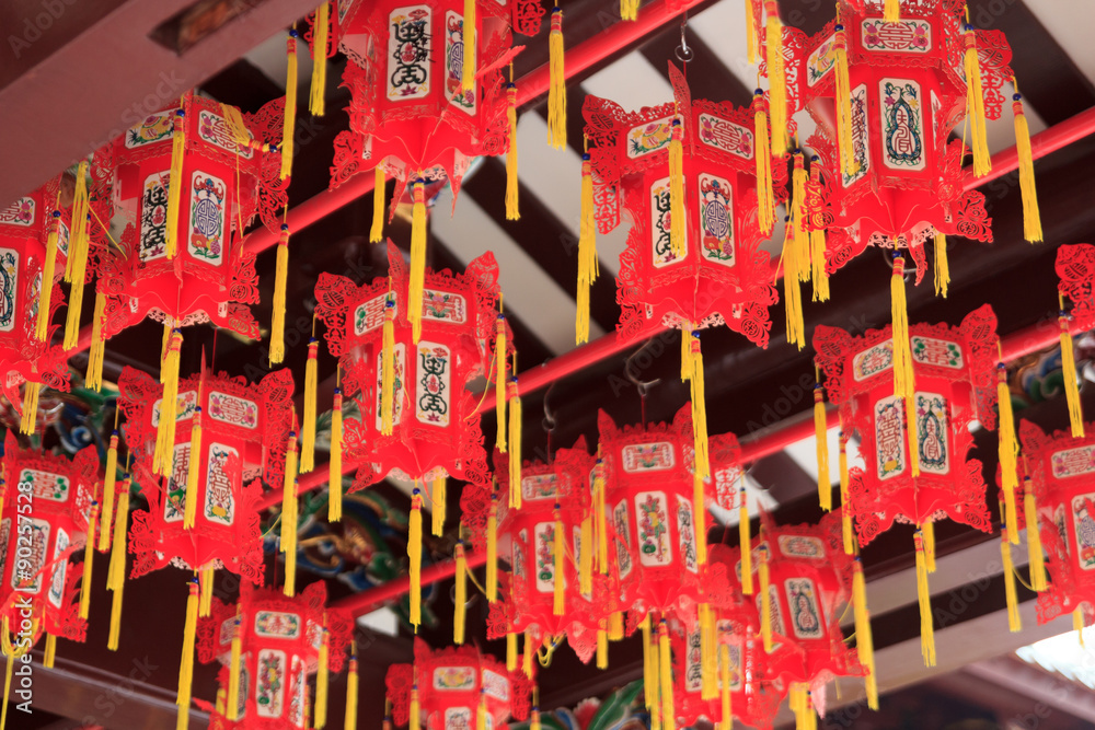 Fototapeta premium Closeup of red chinese lanterns in buddhistic temple in chinatown, Singapore