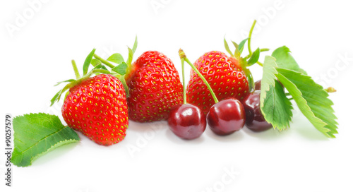 strawberries and cherries isolated on a white background