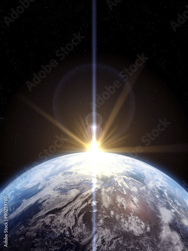 3 D render of Earth with Sun rising.