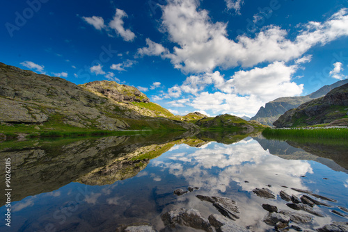 Fototapeta Naklejka Na Ścianę i Meble -  Small high mountain lake with transparent