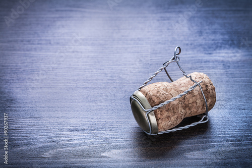 close up view on champagne corck with wire photo