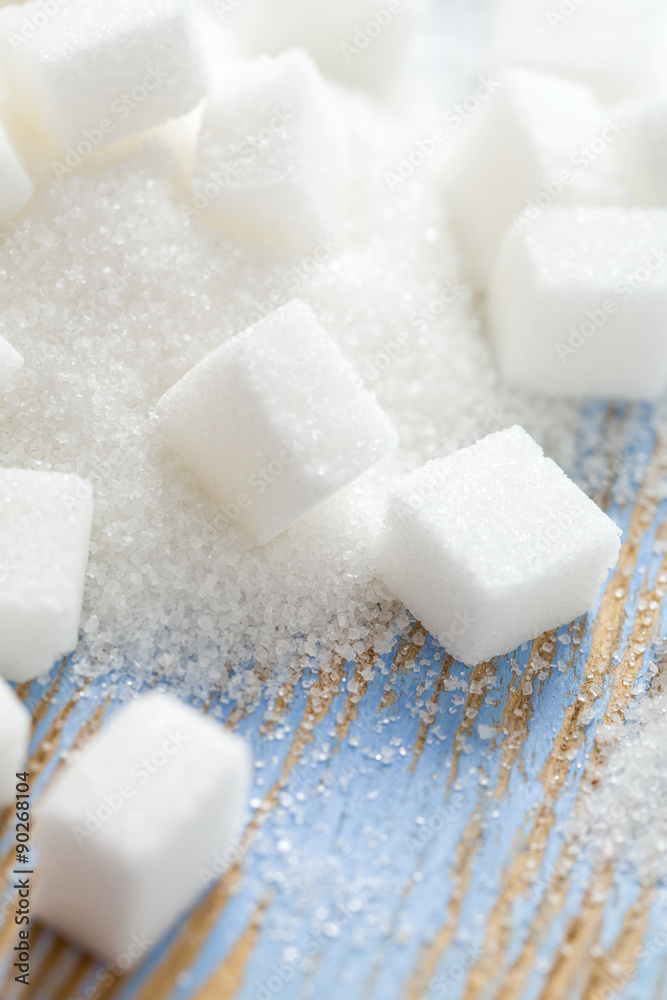 white sugar cubes on wooden surface white sugar cubes on wooden surface