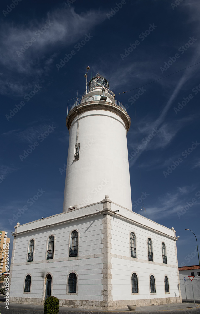 Faro llamado la farola de Málaga situado en el puerto de la ciudad Faro llamado la farola de Málaga situado en el puerto de la ciudad