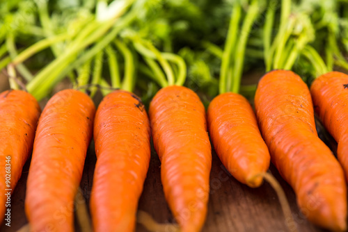 food background, farm fresh vibrant carrots