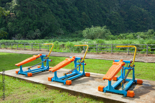 Exercise equipment in public park in the morning at Thailand