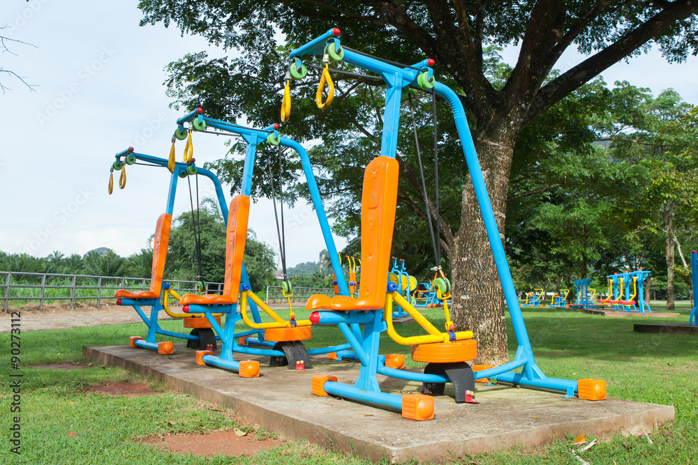 Exercise equipment in public park in the morning at Thailand Exercise equipment in public park in the morning at Thailand