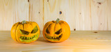 pumpkins on wooden background